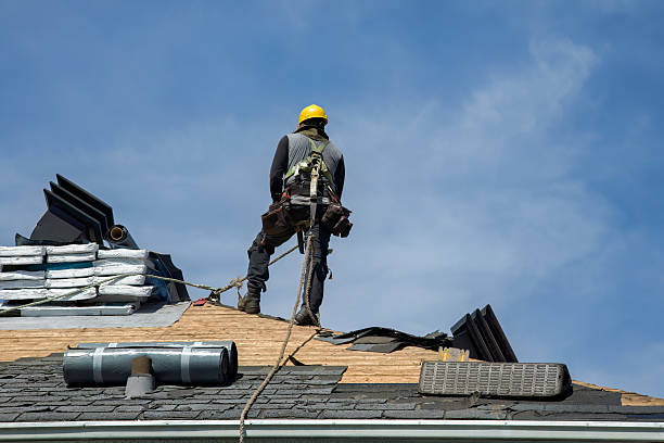 Professional Roof Replacement technician working in Ashfield, MA